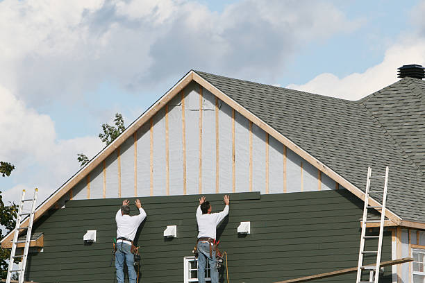 Professional Emergency Siding Repair technician working in Highland, IN